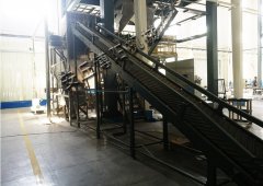 碳酸钙粉小袋拆包机，PP颗粒自动卸料机厂的图片