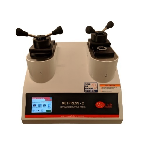 美国MetLab双筒全自动热压镶嵌机的图片